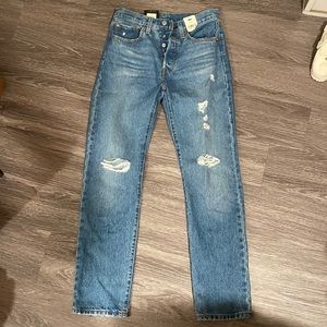 Levi’s 501 Original Straight Leg. Dark wash with disressed knees.